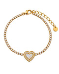 18K gold PVD Eternal Heart bracelet in 316L stainless steel, featuring a sparkling tennis chain and a heart-shaped mother-of-pearl effect centerpiece.