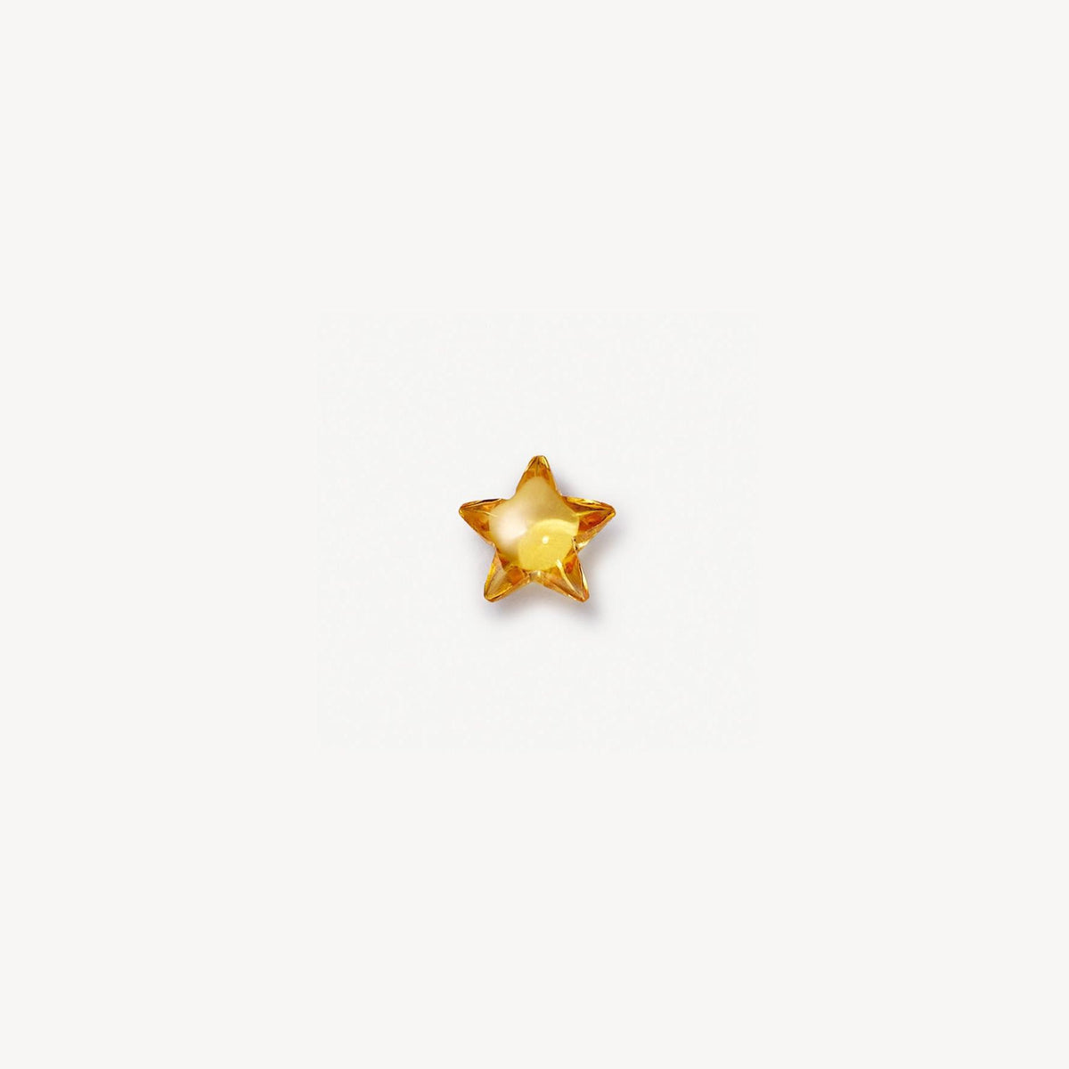 Gold Star floating charm for a Remember locket by Coeur Ailleurs.